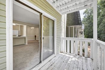 A view of a house's deck and patio area at Peachtree Place Apartments, Columbia, South Carolina